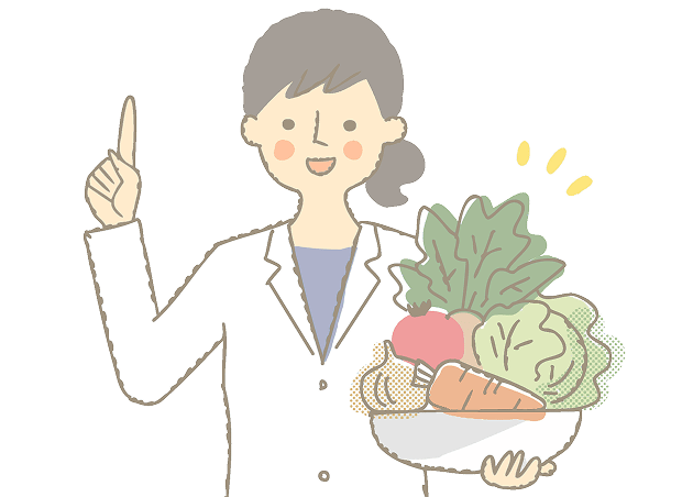 白衣を着た女性が野菜のボウルを持っている画像です。