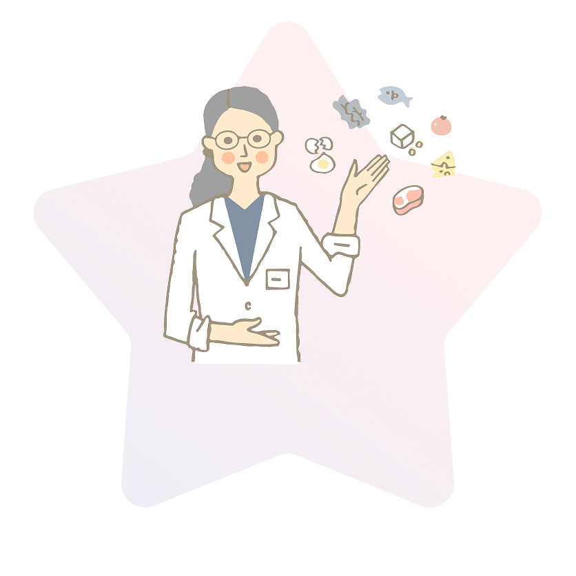 白衣を着た女性が星形の物体を持っています。